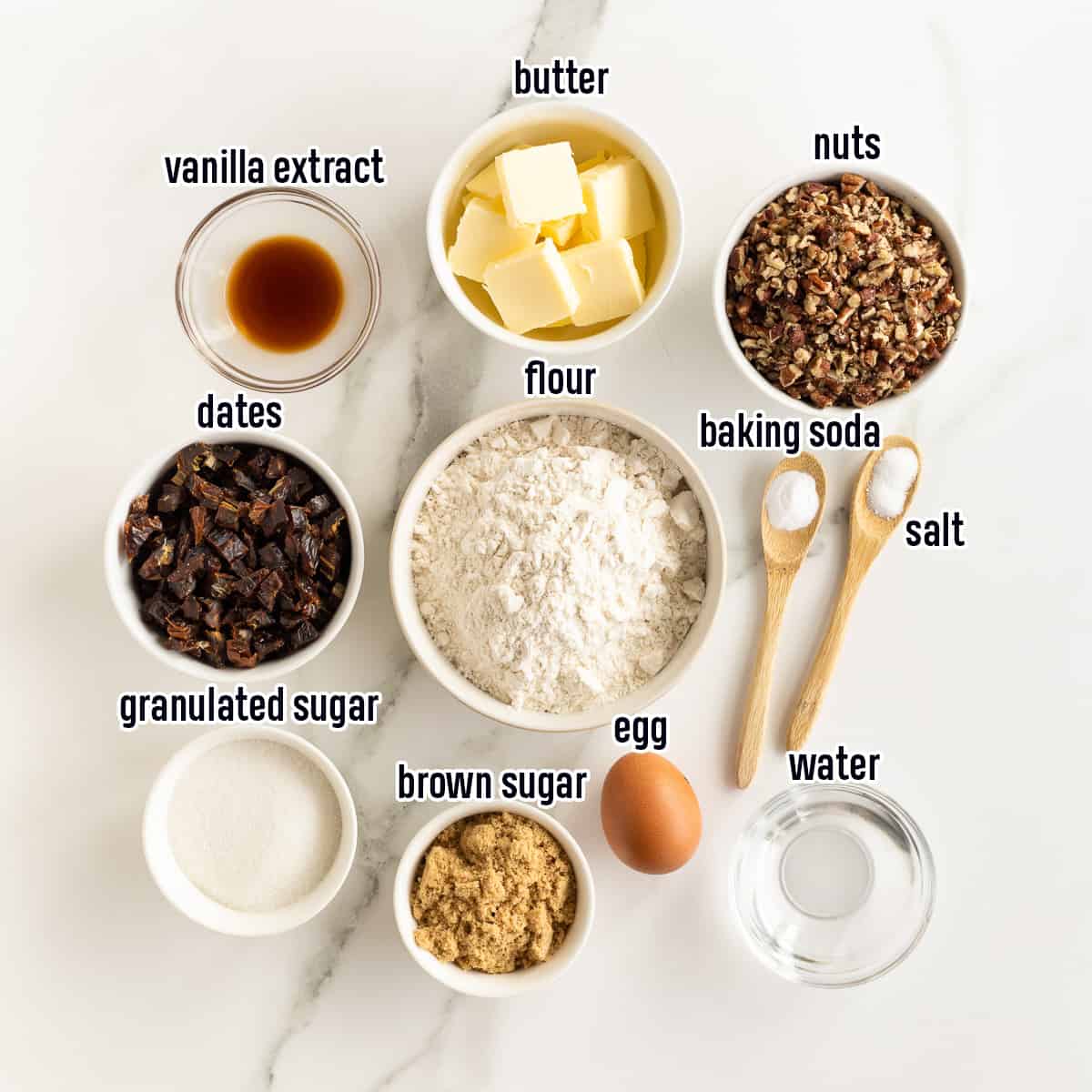 Flour, dates, nuts and other ingredients in bowls with text.