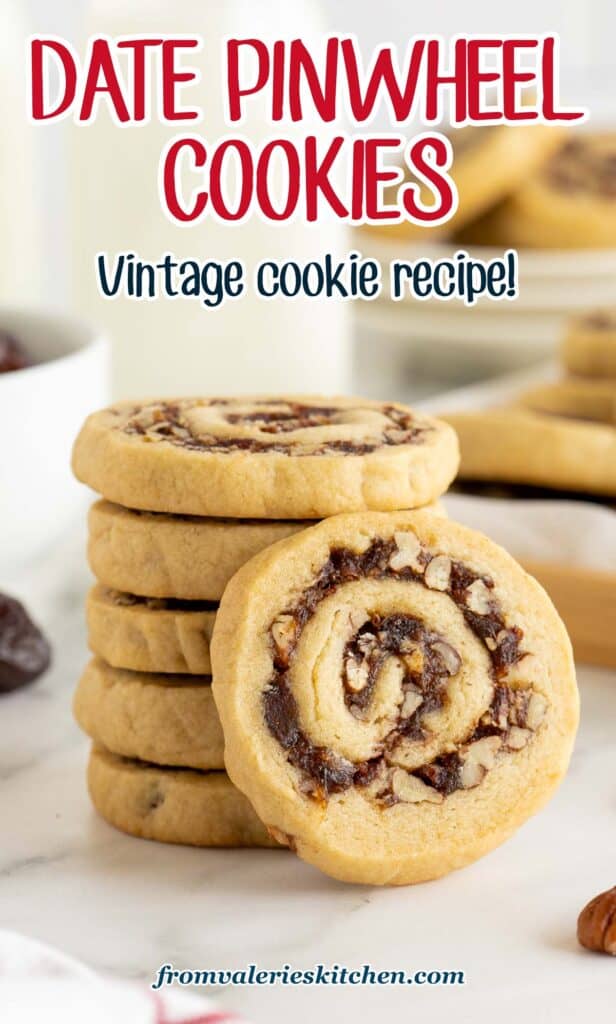 A date pinwheel cookie leaning against a stack of cookies on a kitchen counter with text.