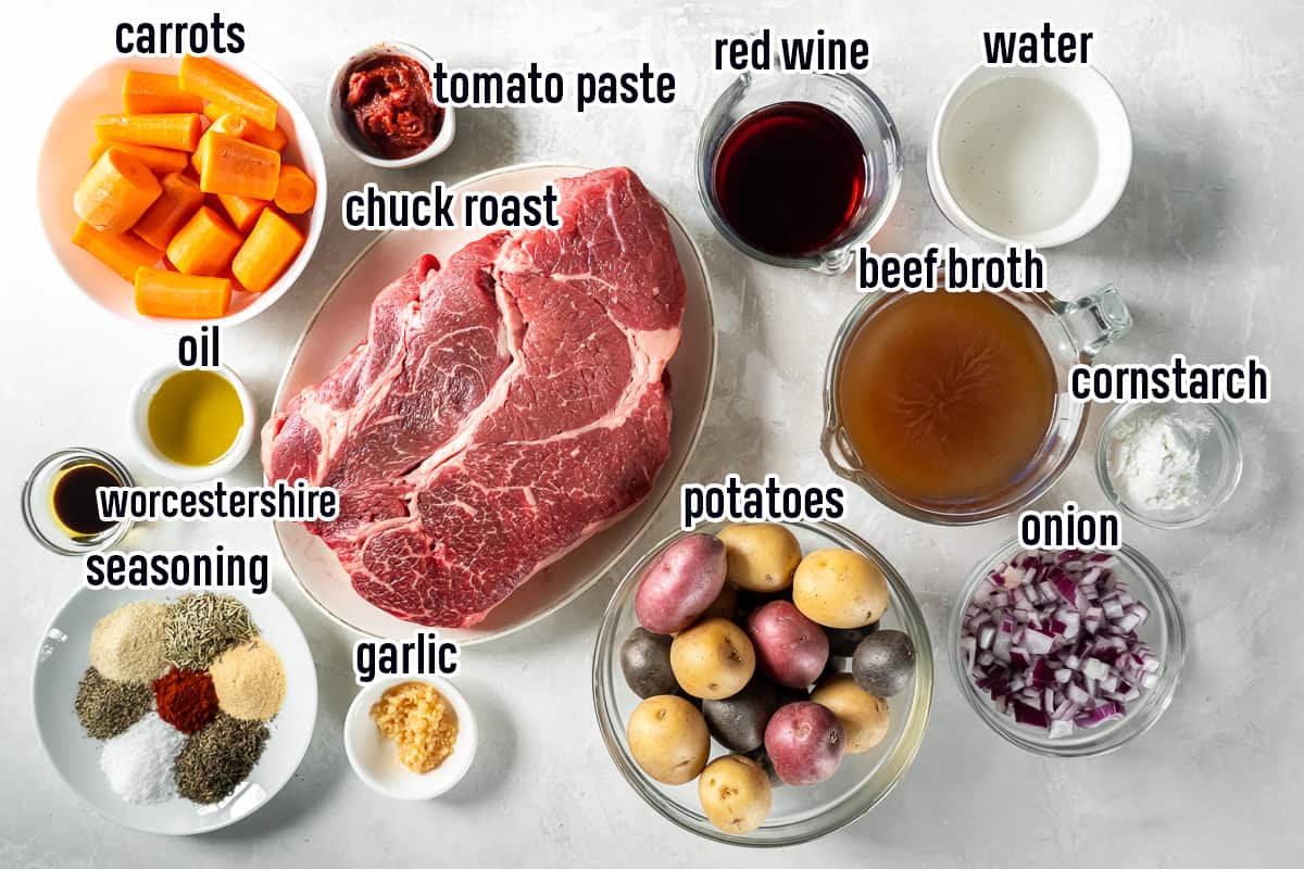 Chuck roast, carrots, potatoes, and other pot roast ingredients in small bowls with text.