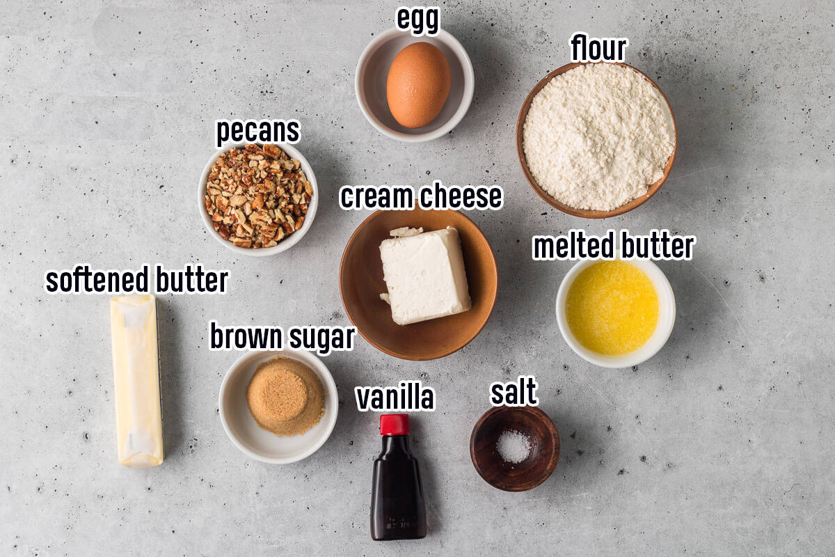 Flour, pecans, an egg and other ingredients in small bowls with text.