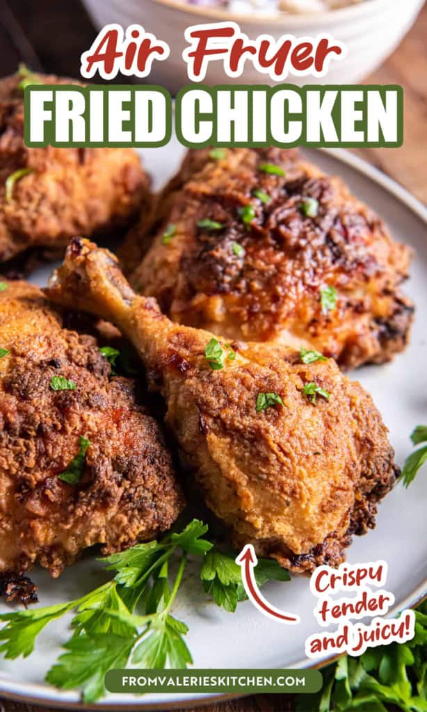 Pieces of fried chicken on a plate with parsley with text overlay.