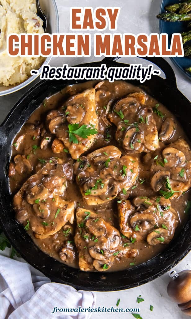 Chicken marsala with mushrooms in a cast iron skillet with text.