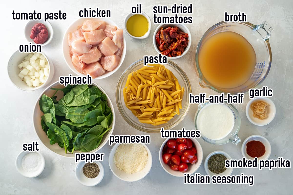 Penne pasta, chicken, spinach and other ingredients in bowls with text.