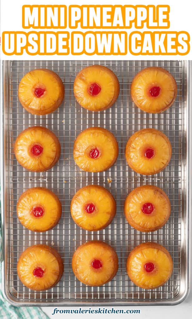 Mini pineapple upside down cakes on a wire cooling rack with text.