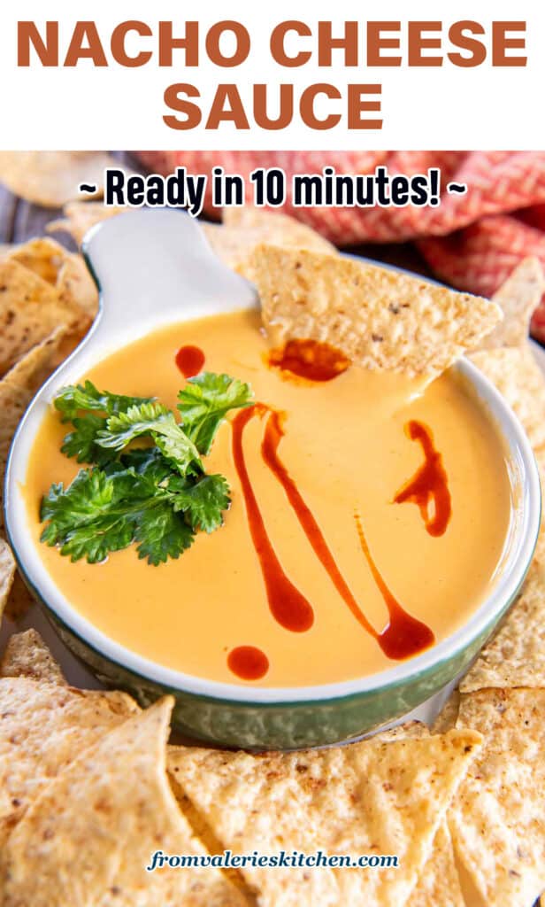 A tortilla chip dipping into a small dish of nacho cheese sauce with text.