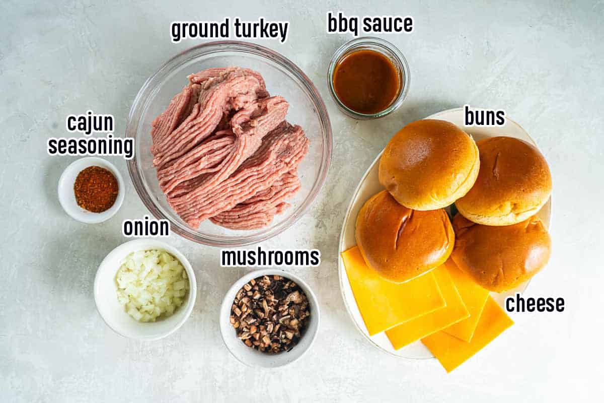 Ground turkey and other turkey burger ingredients in bowls with text