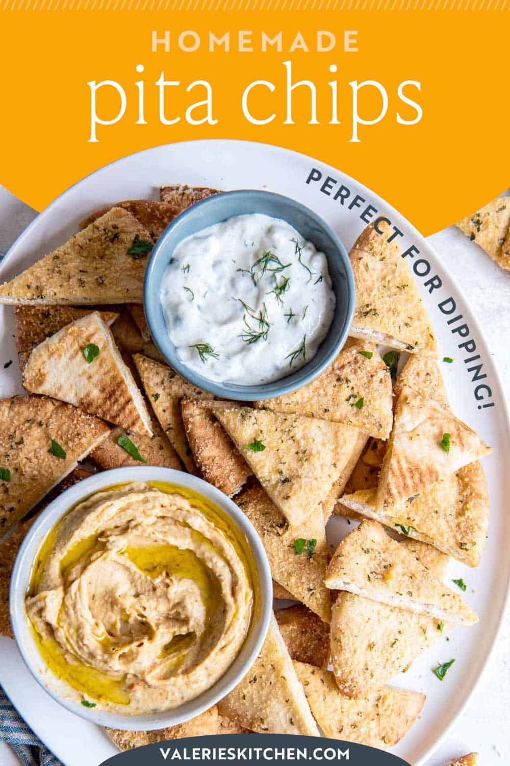 Homemde pita chips on a platter with small bowls of tzatziki sauce and hummus with overlay text.