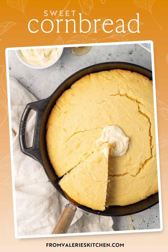 Cornbread topped with butter in a cast iron skillet with text overlay.