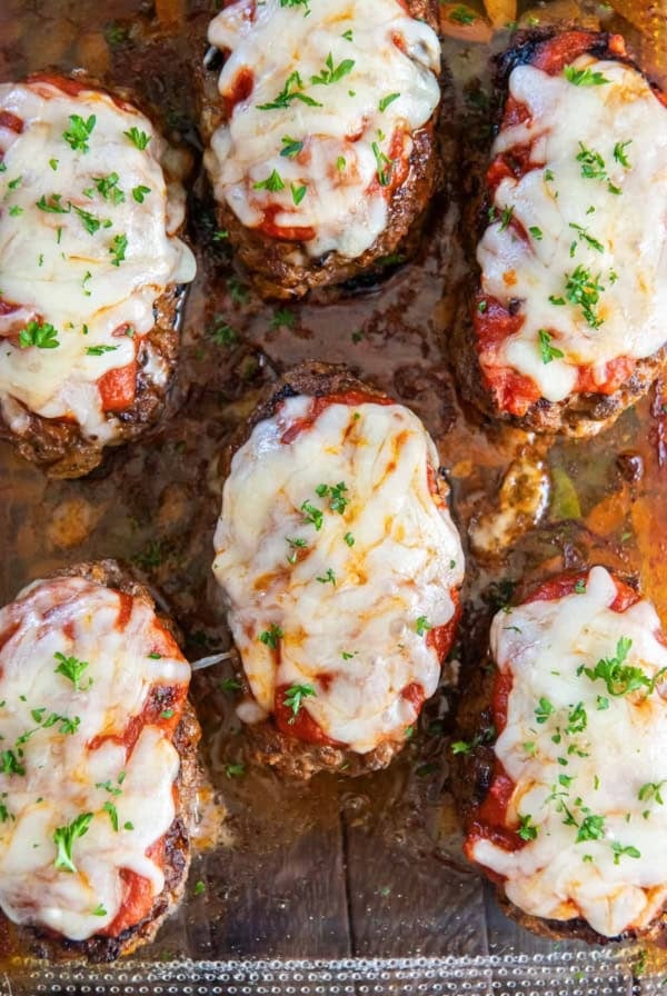 Italian hamburger steaks in a baking dish.