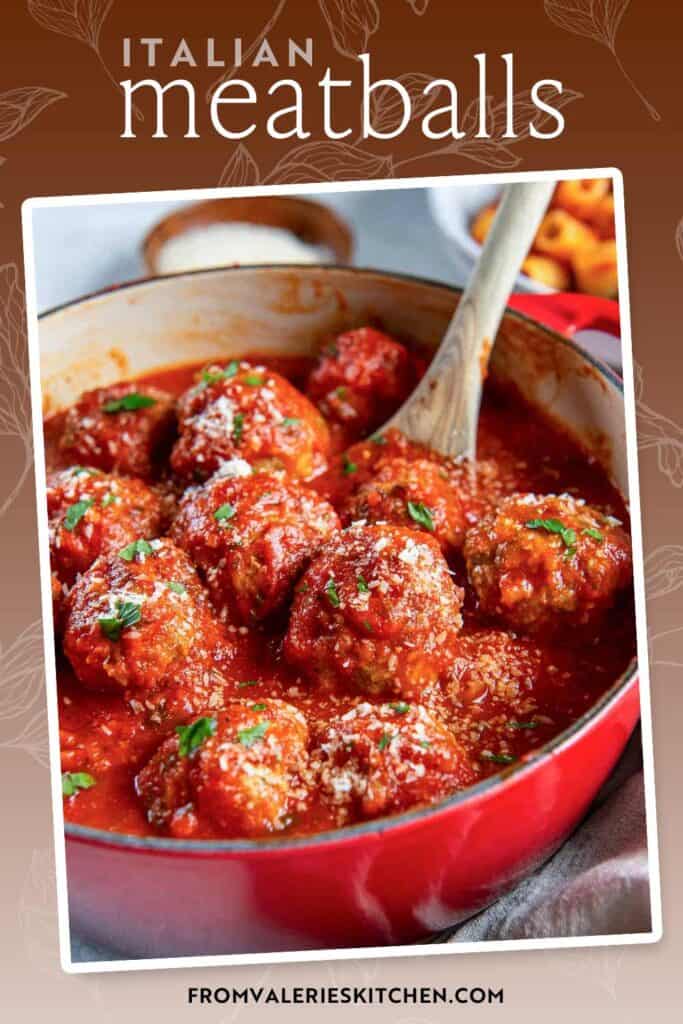 Italian meatballs in marinara sauce in a Dutch oven with text overlay.