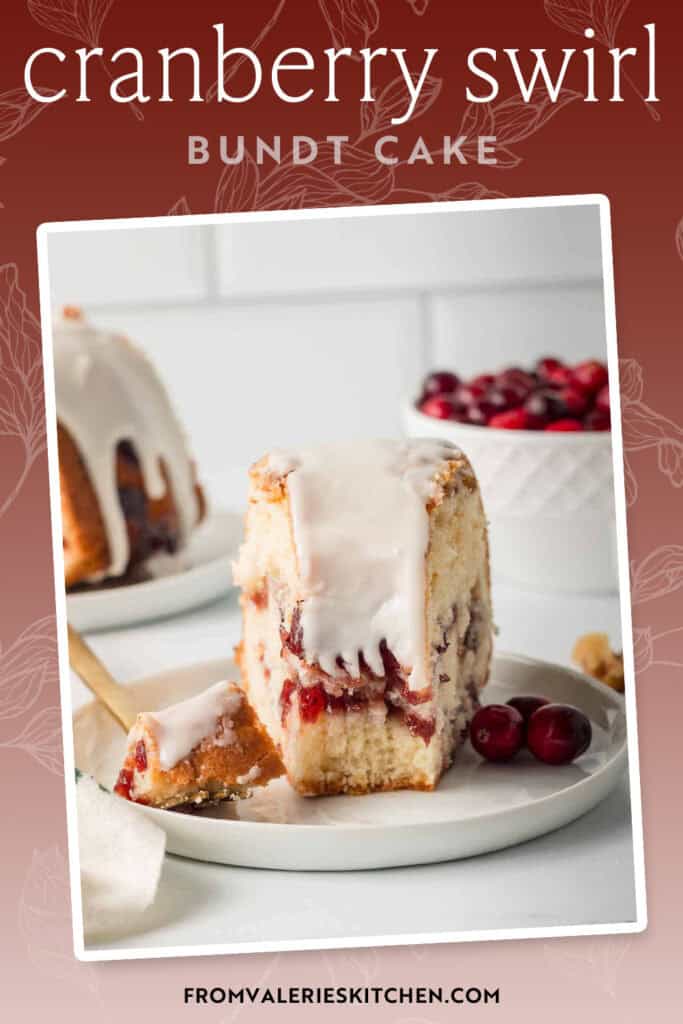 A fork resting on a plate with a slice of cranberry bundt cake with text overlay.