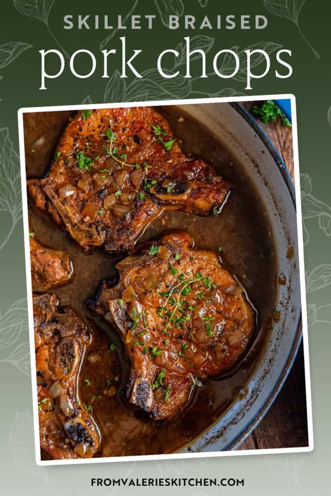 Four pork chops in a skillet with braising liquid with text overlay.