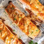 Bang bang salmon on a foil lined baking sheet.