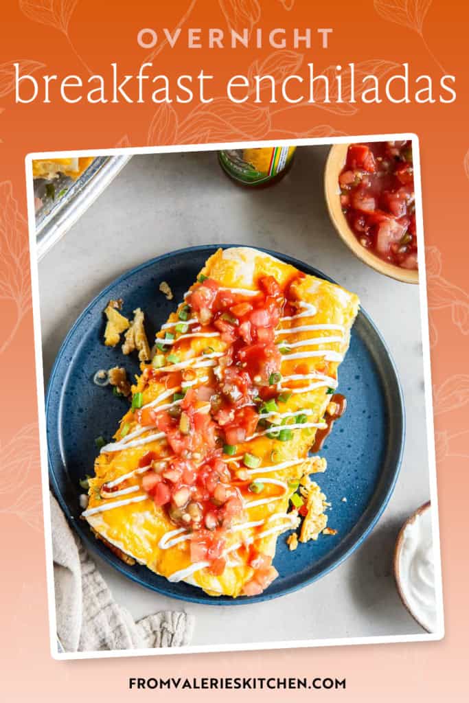 Two ham and cheese breakfast enchiladas on a blue plate with text overlay.
