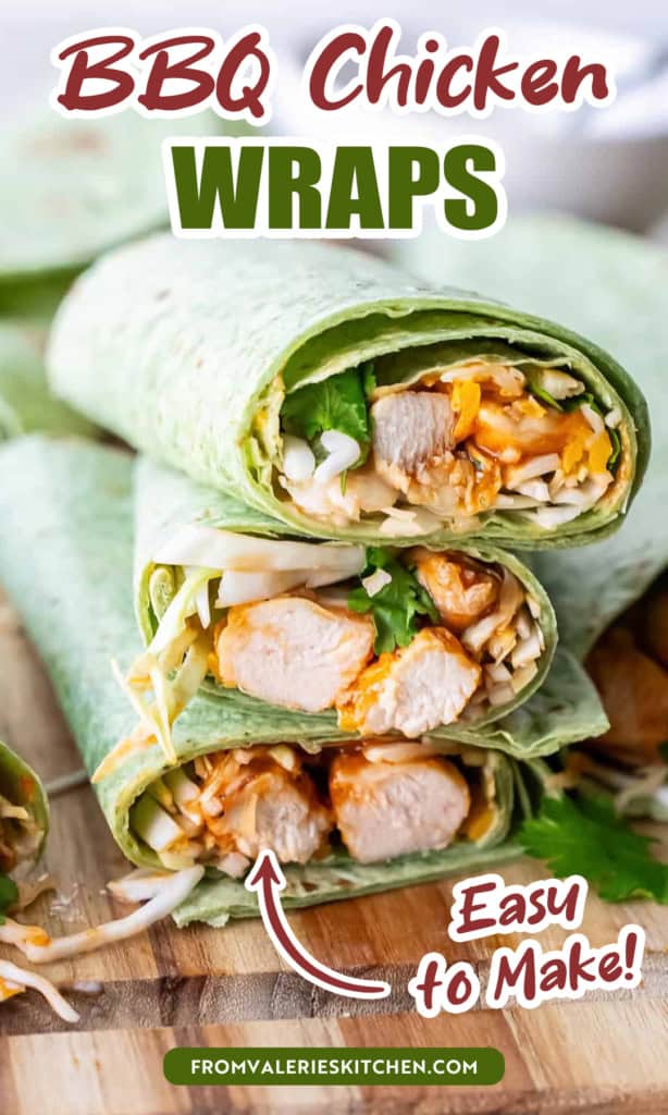 Halved bbq chicken wraps in green spinach tortillas stacked on a cutting board with text overlay.