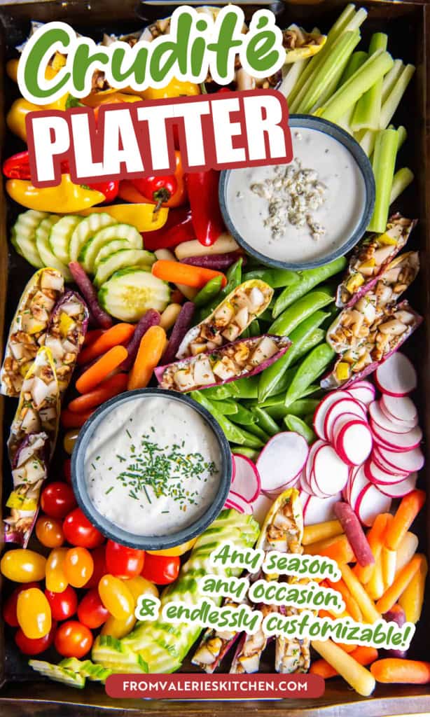 A crudite platter with assorted vegetables and two dips in small bowls with text overlay.