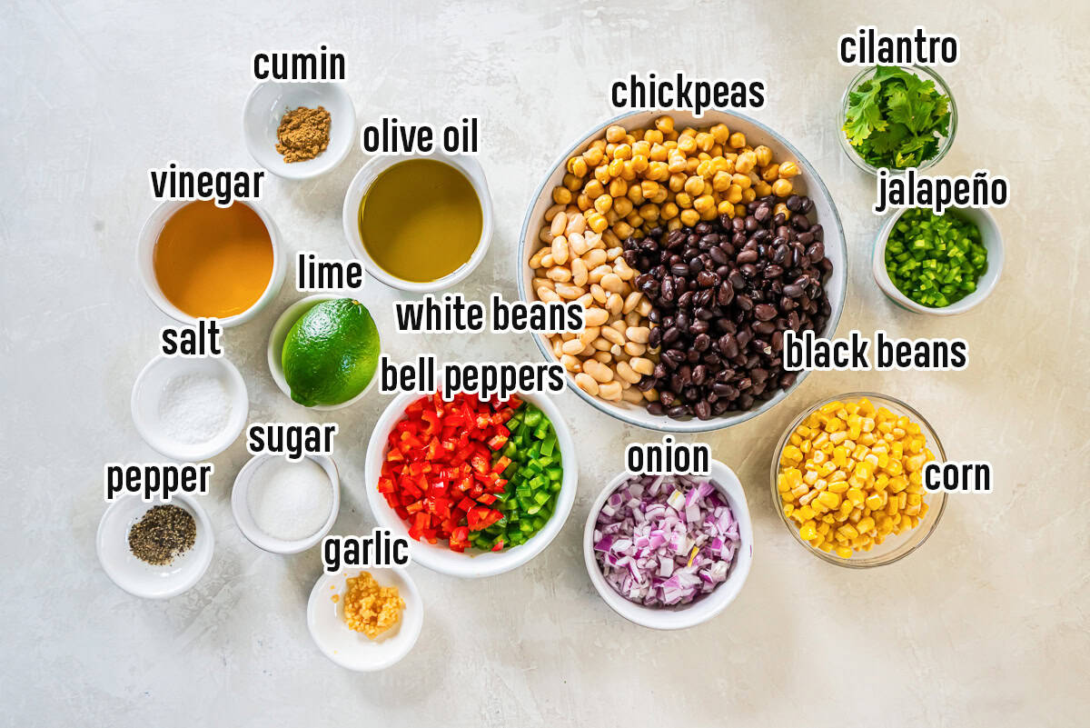 Mexican Bean Salad 3 Chickpeas, black beans, white beans and other ingredients in bowls with text overlay.