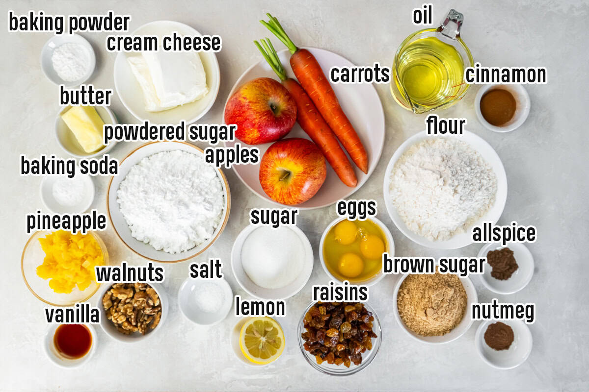 Ingredients for apple carrot cake on a plate and small bowls with text overlay.