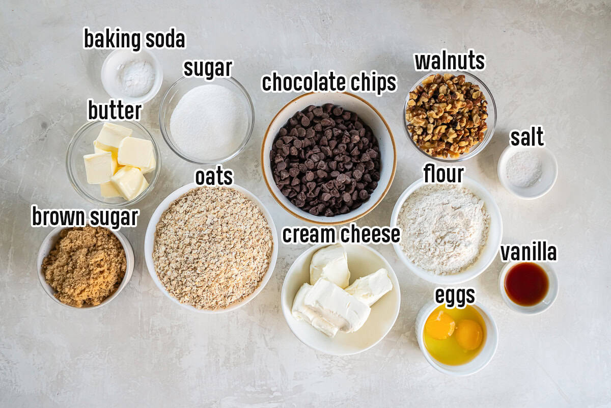 Chocolate Oatmeal Cookies 4 Flour, oats, chocolate chips and other ingredients in bowls with text overlay.