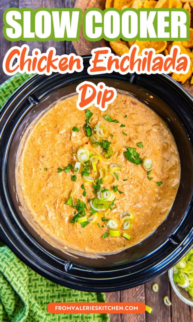 Chicken enchilada dip in a slow cooker topped with sliced green onions and cilantro with text overlay.