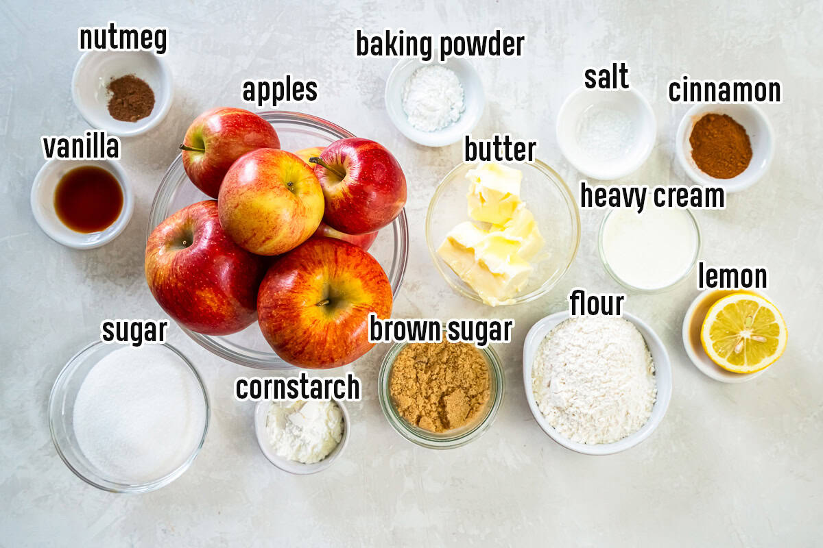 Apples, butter, sugar, and other cobbler ingredients in bowls with text overlay.