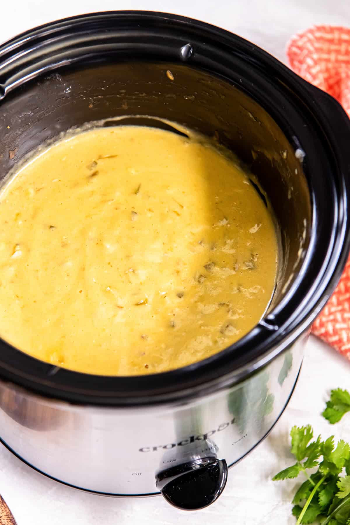 Slow cooker chicken queso in a Crock-Pot.