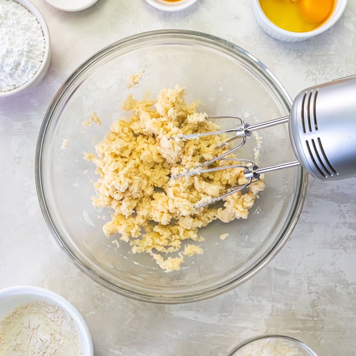 Butter, sugar, and flour mixed to form coarse crumbs for the apricot bar crust.