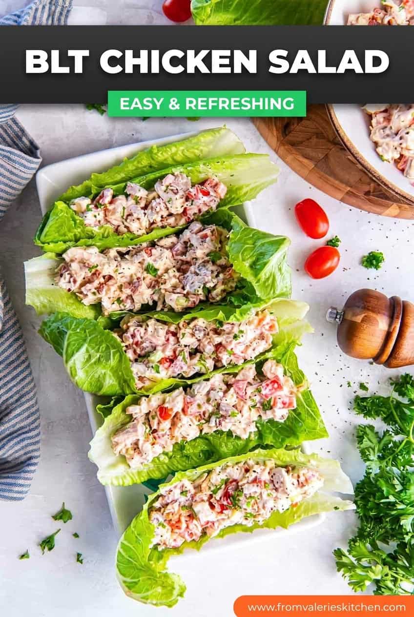 BLT chicken salad served in romaine lettuce wraps on a platter, garnished with fresh parsley and black pepper with text overlay.