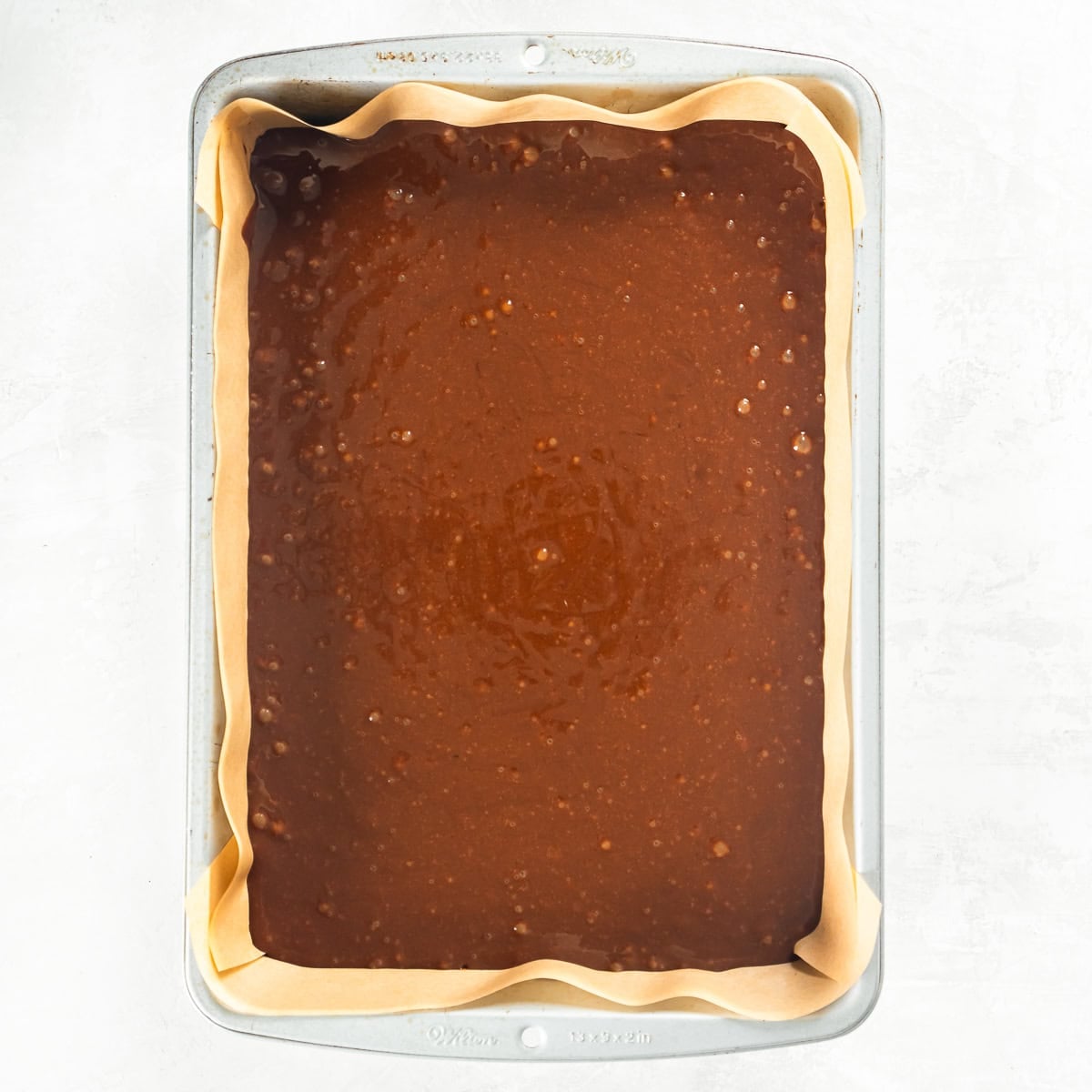 Chocolate Peanut Butter Sheet Cake batter poured into a prepared 13- x 9-inch baking pan.