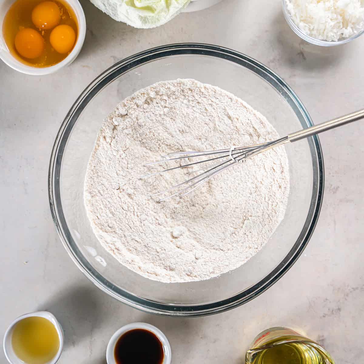 Dry ingredients whisked together for Pineapple Zucchini Bread in a large mixing bowl.