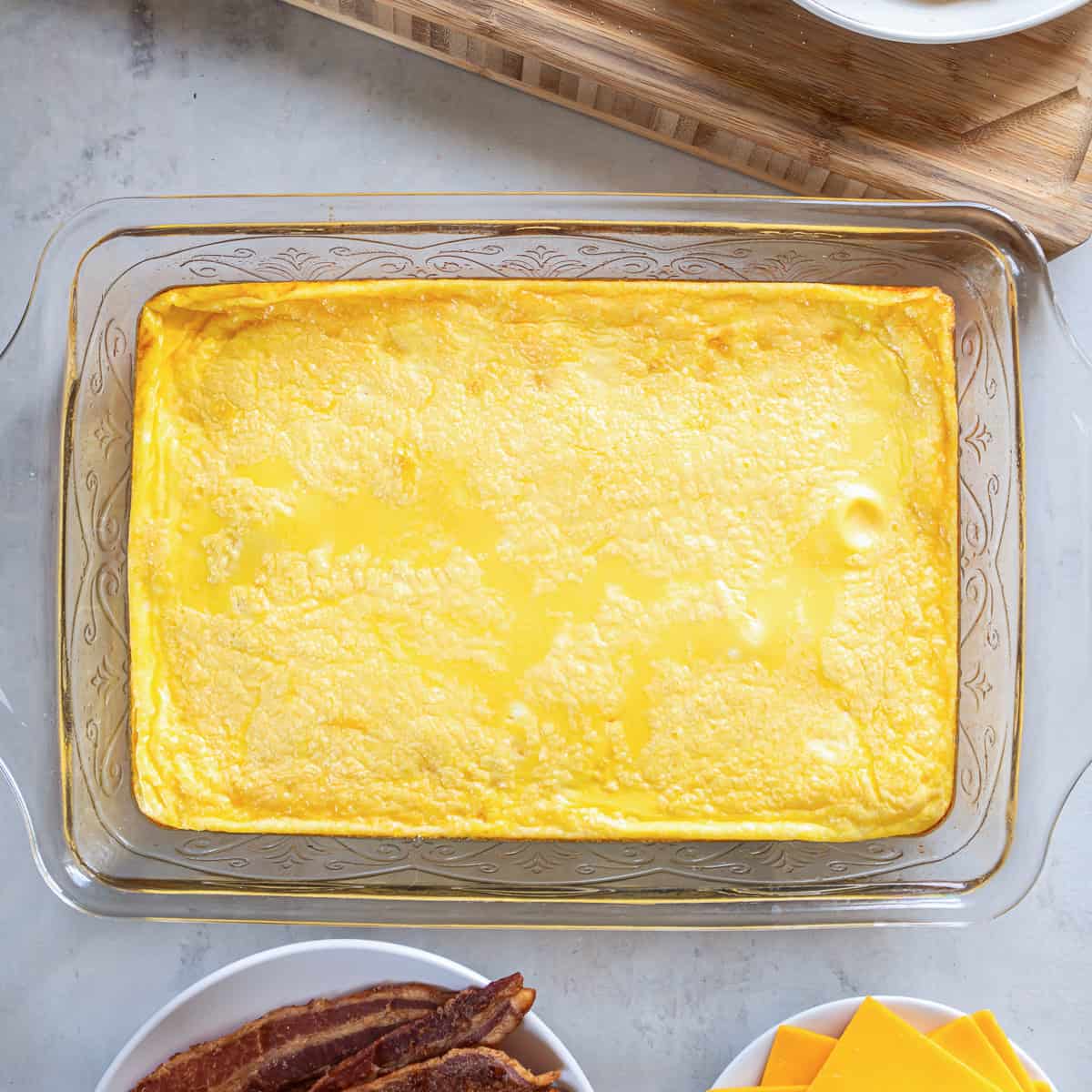 Baked egg mixture in a 13- x 9-inch glass baking dish.