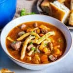 Old-fashioned beef noodle soup with tender beef, thick egg noodles, carrots, celery, and parsley in a rich beef broth.