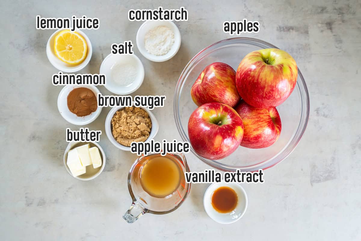 : Ingredients for sautéed cinnamon apples, including apples, butter, brown sugar, cinnamon, apple juice, lemon juice, cornstarch, salt, and vanilla extract.