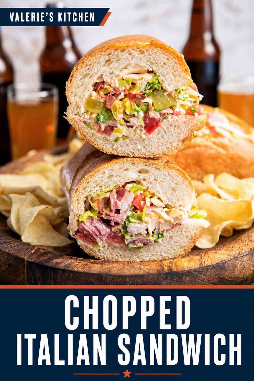 Chopped Italian Sandwich halves stacked on a wooden board, showing the creamy chopped deli meat, cheese, lettuce, tomato, pickles, and banana pepper filling with bold title text overlay.