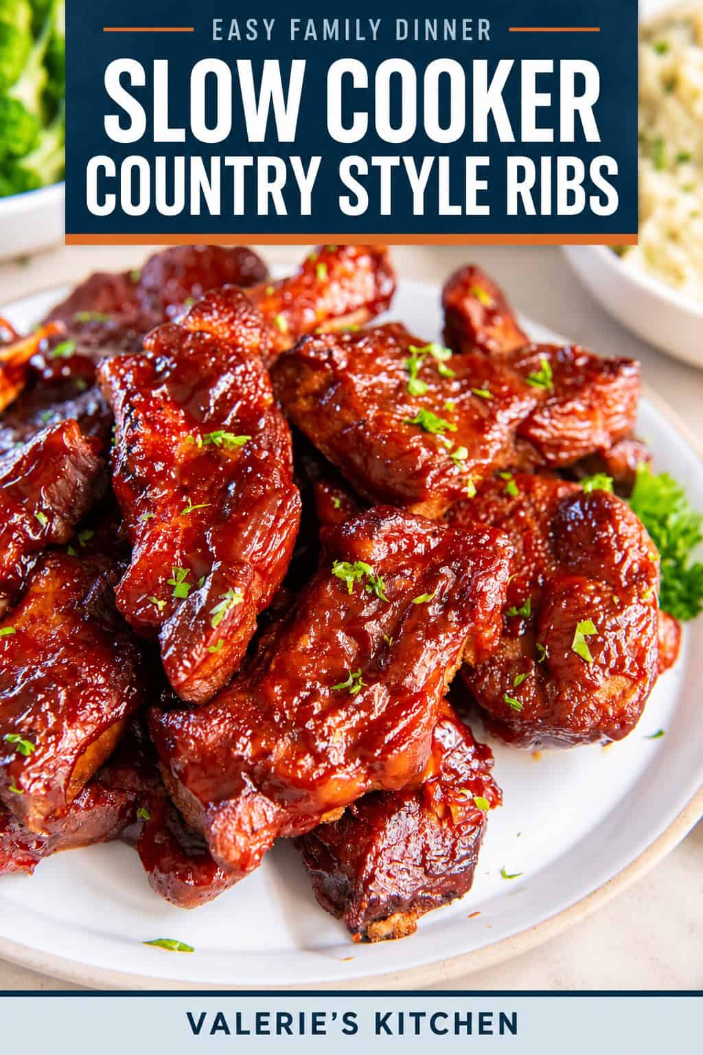 Slow Cooker Country Style Ribs coated in a sticky, caramelized BBQ sauce and garnished with parsley with bold title text overlay.