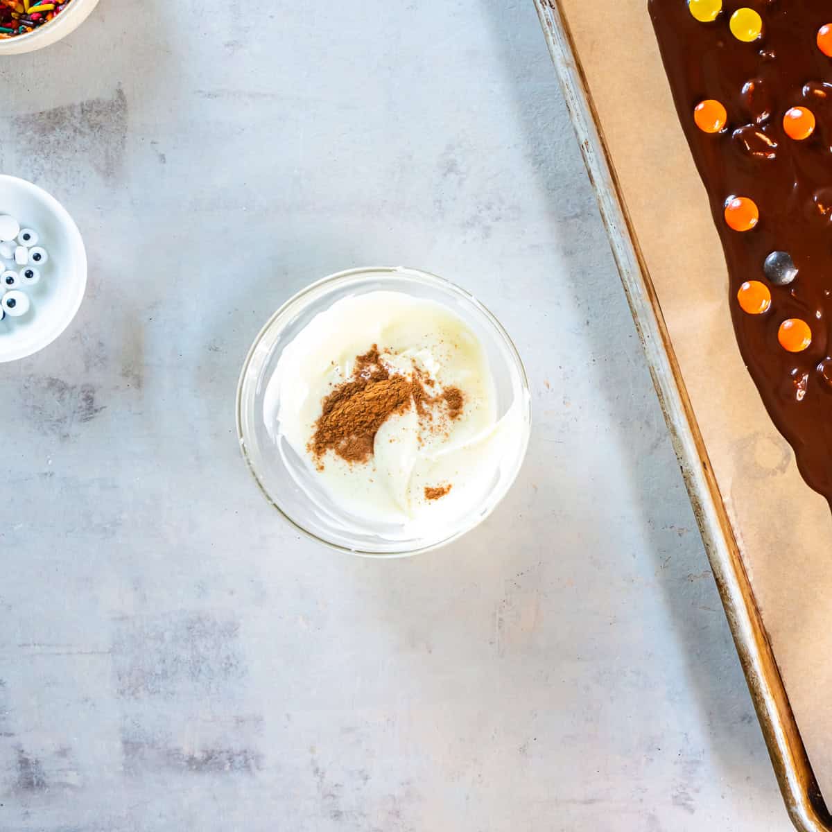Pumpkin pie spice added to melted white chocolate for the bark drizzle.