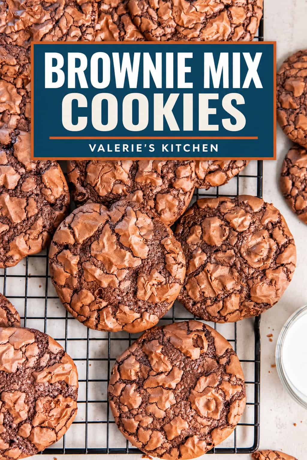 Brownie mix cookies with shiny, crackly tops arranged on a wire cooling rack with bold title text overlay.