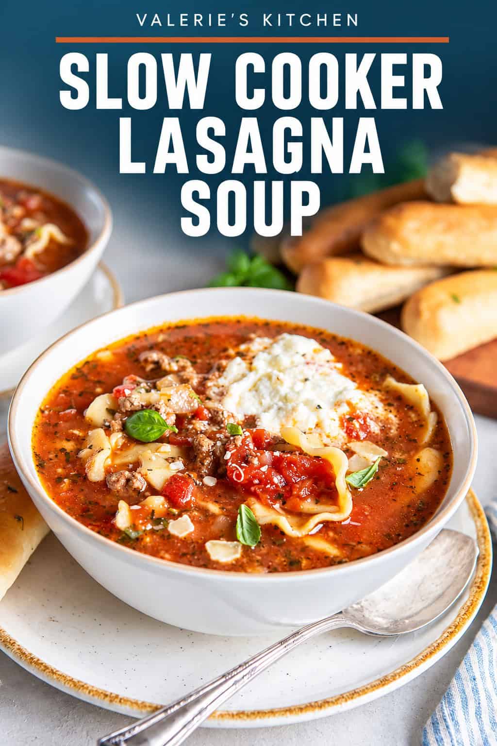 A bowl of slow cooker lasagna soup with a pile of soft breadsticks behind it with bold title text overlay.